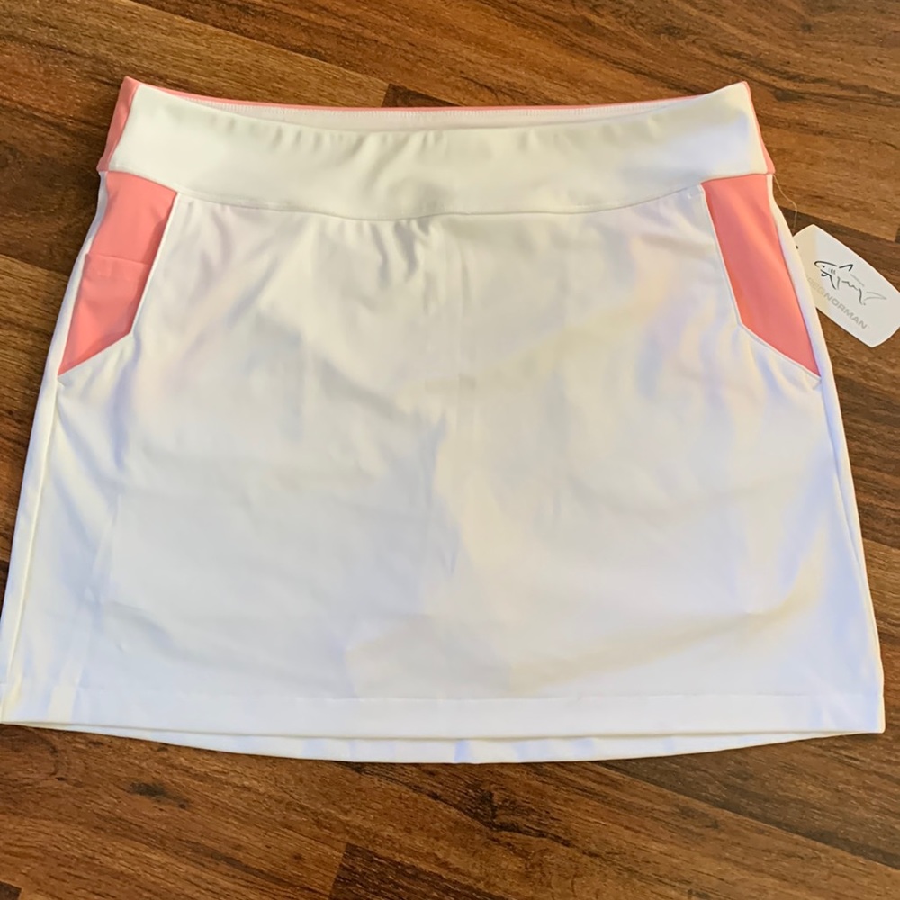 Greg Norman golf skort white with pink accents